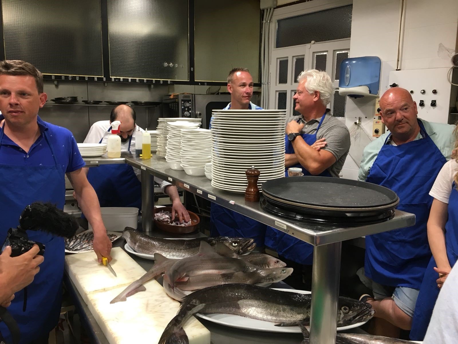 preparing fish Seafood cooking class